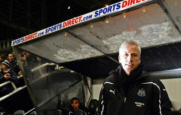 Alan Pardew in the dugout.