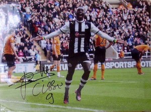 First prize - 16" x 12" signed photo of Papiss Cisse.