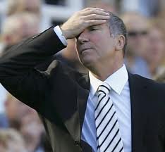 Graeme Souness slaps head in frustration.
